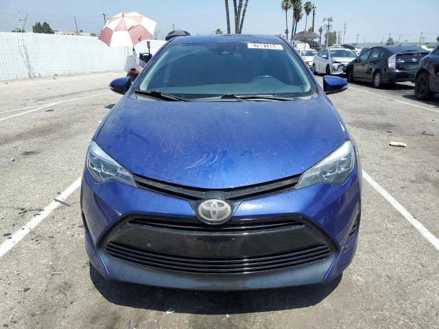 Photo 4 VIN: 5YFBURHE3HP696159 - TOYOTA COROLLA L 