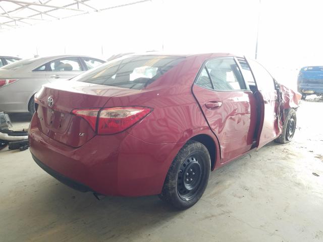 Photo 3 VIN: 5YFBURHE3HP698395 - TOYOTA COROLLA L 