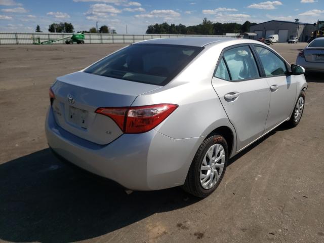 Photo 3 VIN: 5YFBURHE3HP698641 - TOYOTA COROLLA L 