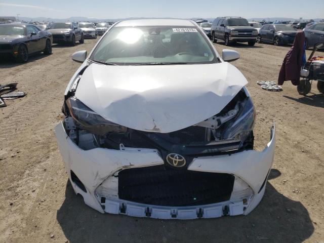 Photo 4 VIN: 5YFBURHE3HP711565 - TOYOTA COROLLA L 