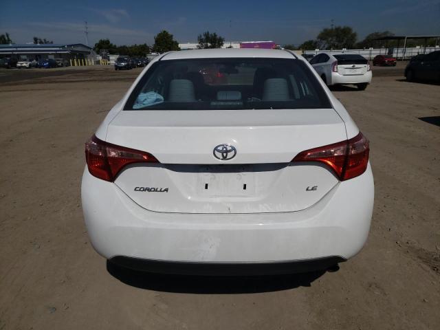 Photo 5 VIN: 5YFBURHE3HP711565 - TOYOTA COROLLA L 