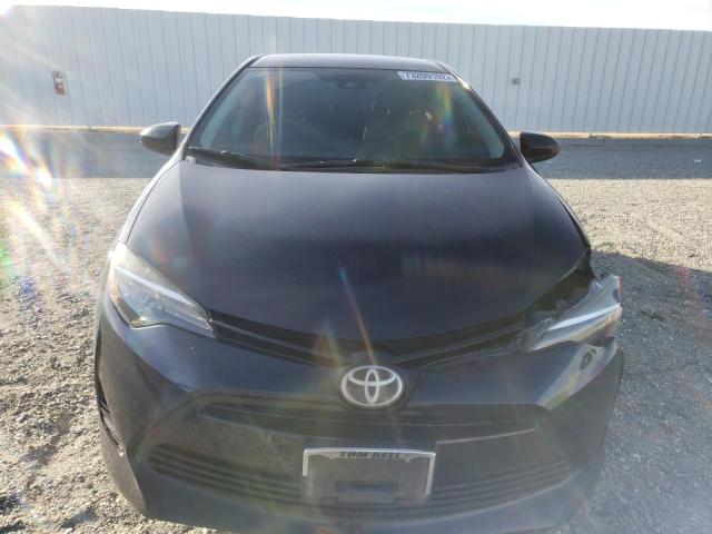 Photo 4 VIN: 5YFBURHE3HP712196 - TOYOTA COROLLA L 