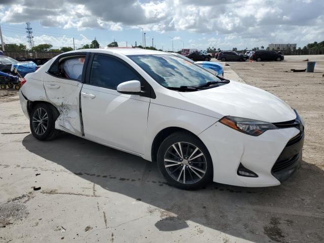 Photo 3 VIN: 5YFBURHE3HP713669 - TOYOTA COROLLA L 