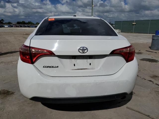 Photo 5 VIN: 5YFBURHE3HP713669 - TOYOTA COROLLA L 