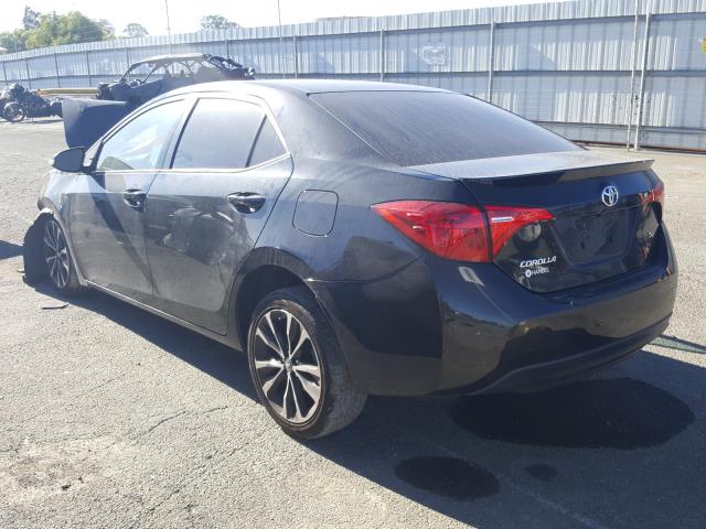 Photo 2 VIN: 5YFBURHE3HP721609 - TOYOTA COROLLA L 