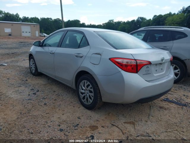 Photo 2 VIN: 5YFBURHE3JP740960 - TOYOTA COROLLA 