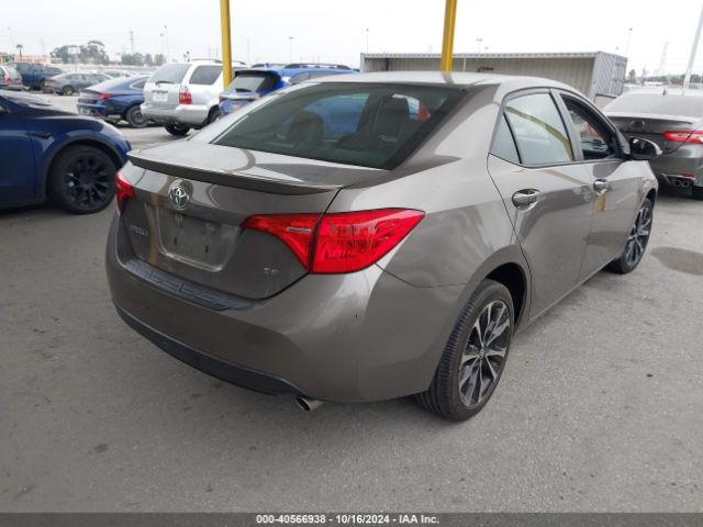 Photo 3 VIN: 5YFBURHE3JP766040 - TOYOTA COROLLA 