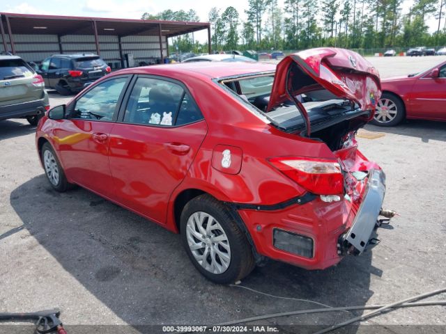 Photo 2 VIN: 5YFBURHE3JP770721 - TOYOTA COROLLA 