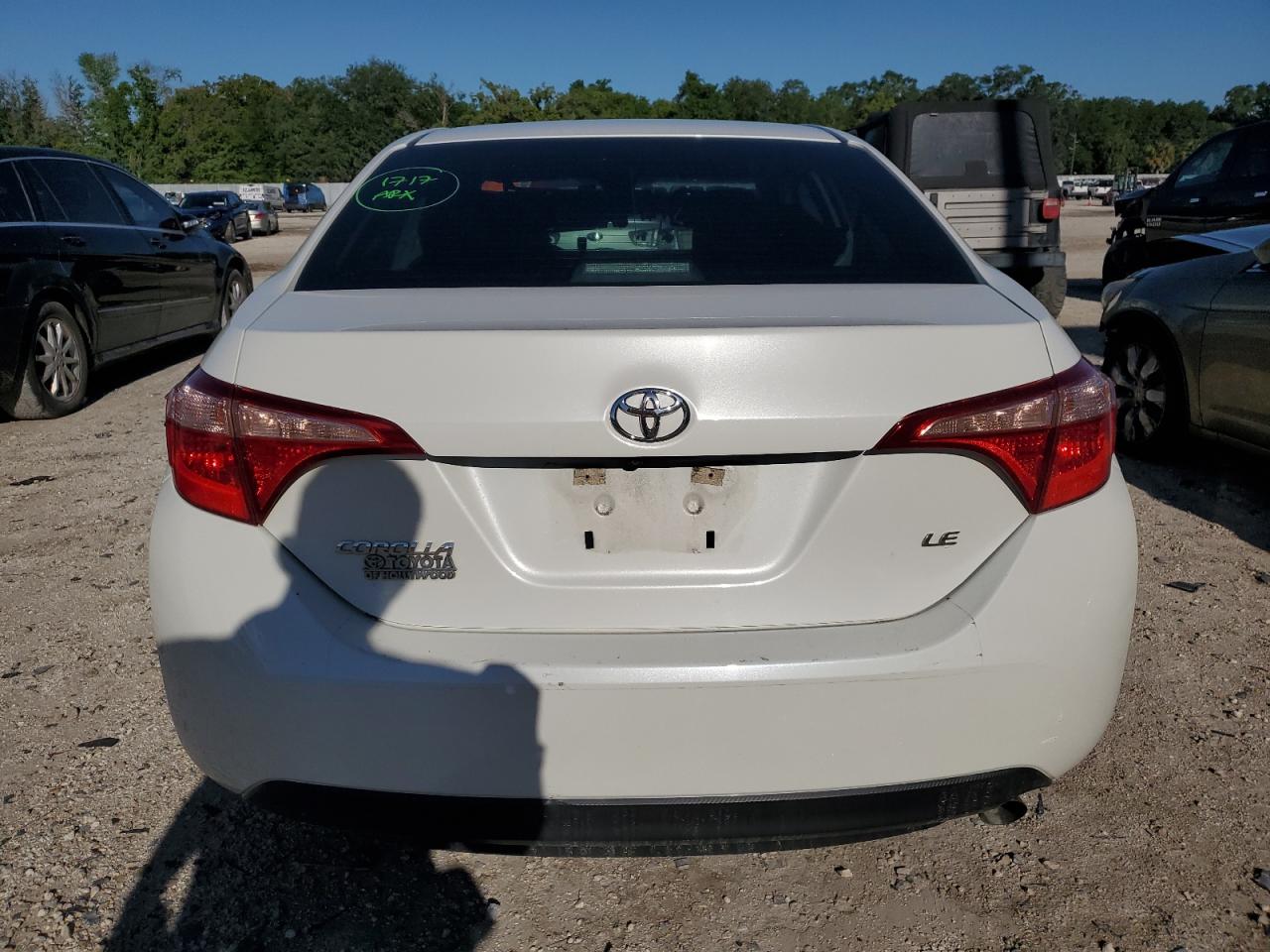 Photo 5 VIN: 5YFBURHE3JP775885 - TOYOTA COROLLA 