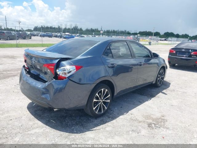 Photo 3 VIN: 5YFBURHE3JP784103 - TOYOTA COROLLA 