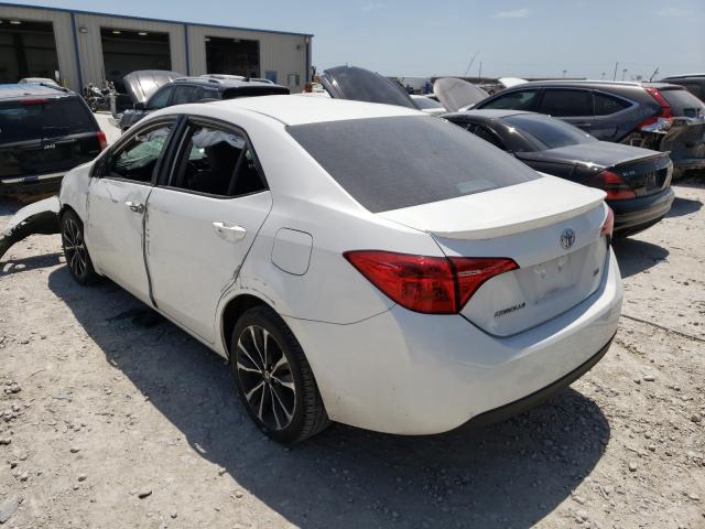 Photo 2 VIN: 5YFBURHE3JP793948 - TOYOTA COROLLA L 