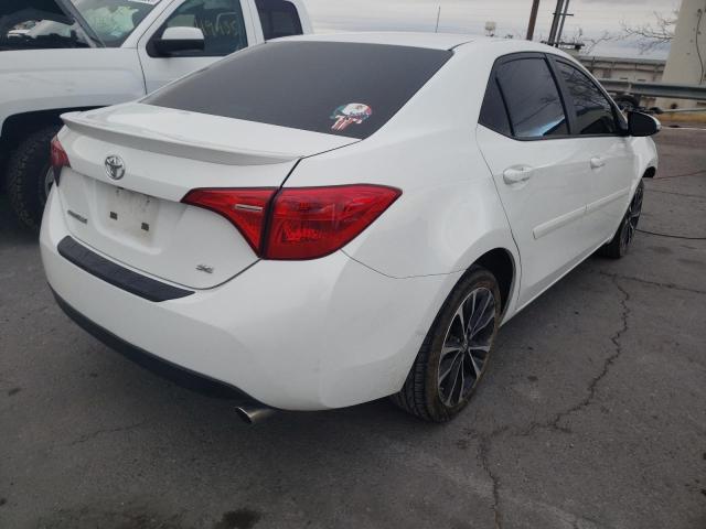 Photo 3 VIN: 5YFBURHE3JP798566 - TOYOTA COROLLA L 