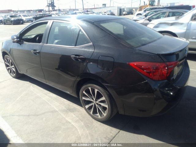 Photo 2 VIN: 5YFBURHE3JP799362 - TOYOTA COROLLA 