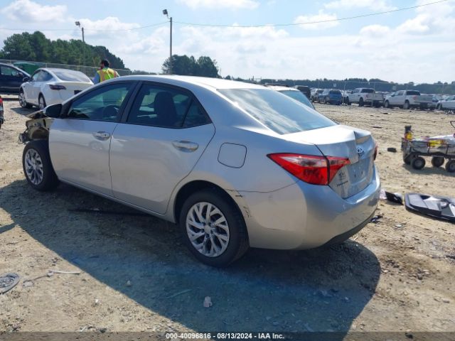 Photo 2 VIN: 5YFBURHE3JP805015 - TOYOTA COROLLA 