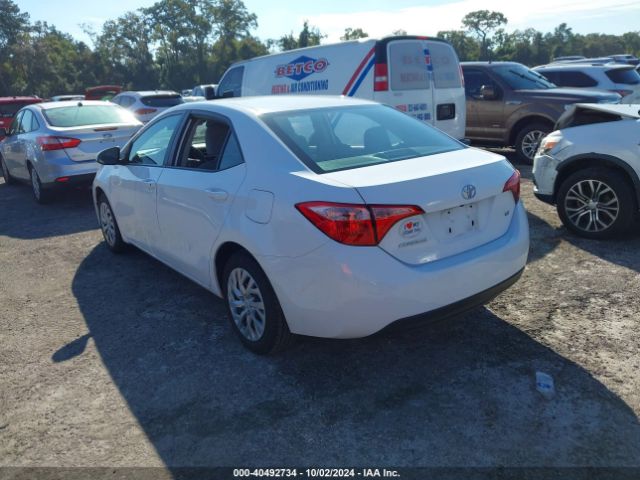 Photo 2 VIN: 5YFBURHE3JP805158 - TOYOTA COROLLA 