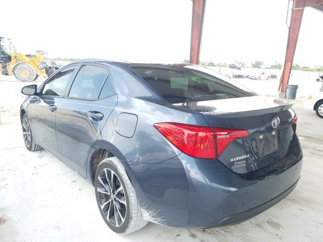 Photo 2 VIN: 5YFBURHE3JP808755 - TOYOTA COROLLA L 