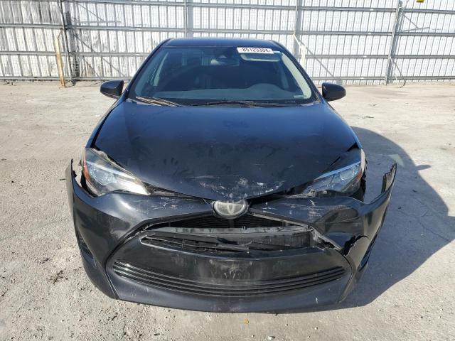 Photo 4 VIN: 5YFBURHE3JP809680 - TOYOTA COROLLA L 