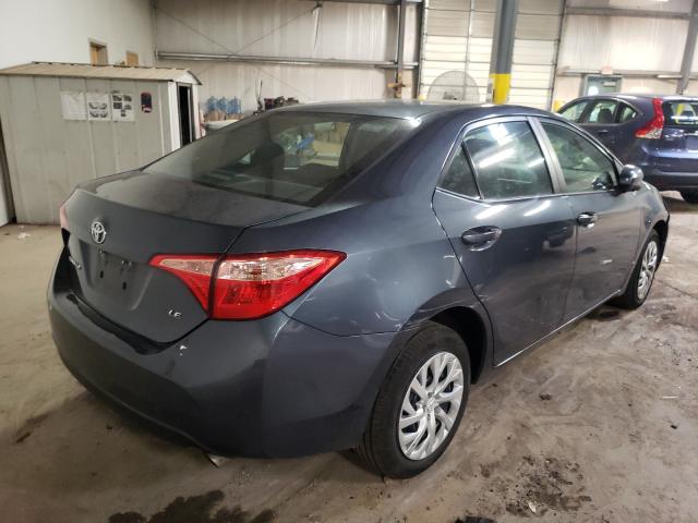 Photo 3 VIN: 5YFBURHE3JP816824 - TOYOTA COROLLA LE 