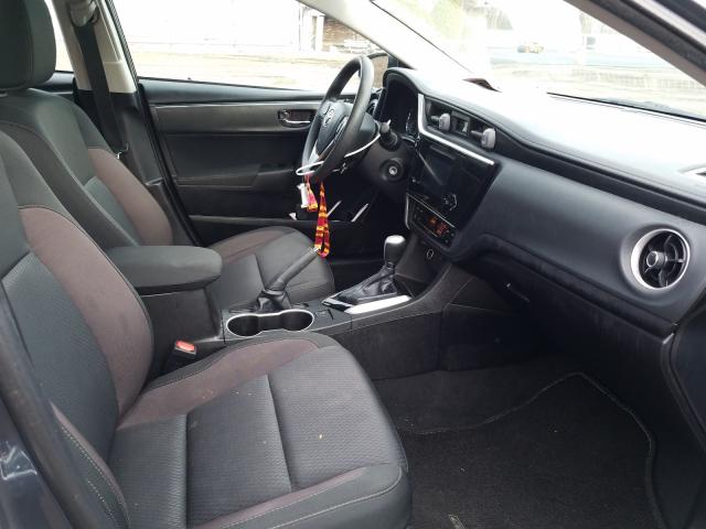 Photo 4 VIN: 5YFBURHE3JP831596 - TOYOTA COROLLA 