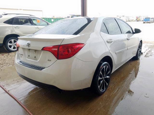 Photo 3 VIN: 5YFBURHE3JP846714 - TOYOTA COROLLA L 