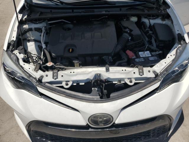 Photo 10 VIN: 5YFBURHE3KP856855 - TOYOTA COROLLA L 