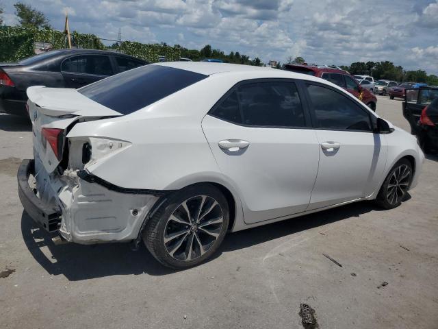 Photo 2 VIN: 5YFBURHE3KP856855 - TOYOTA COROLLA L 