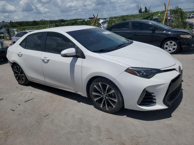 Photo 3 VIN: 5YFBURHE3KP856855 - TOYOTA COROLLA L 