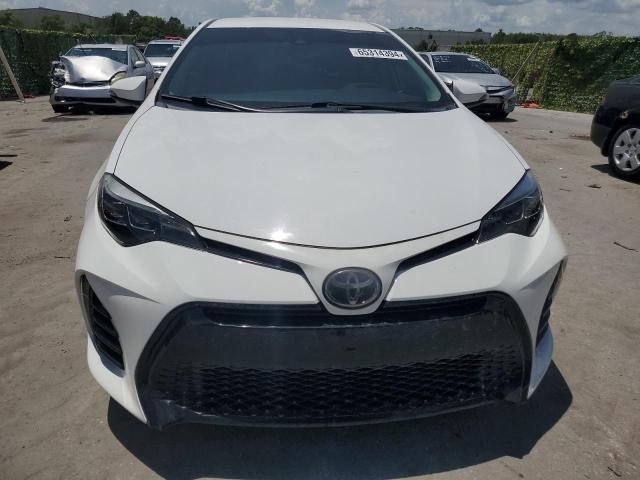 Photo 4 VIN: 5YFBURHE3KP856855 - TOYOTA COROLLA L 