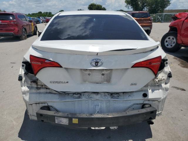 Photo 5 VIN: 5YFBURHE3KP856855 - TOYOTA COROLLA L 