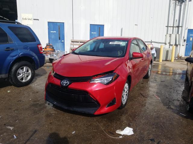 Photo 1 VIN: 5YFBURHE3KP856905 - TOYOTA COROLLA L 