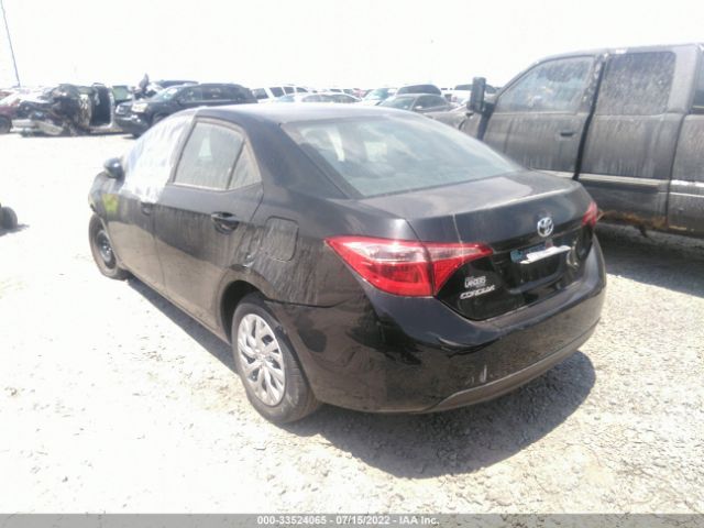 Photo 2 VIN: 5YFBURHE3KP862140 - TOYOTA COROLLA 