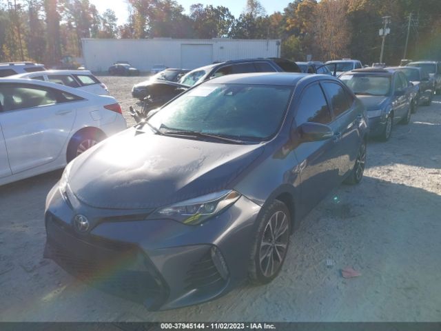 Photo 1 VIN: 5YFBURHE3KP863224 - TOYOTA COROLLA 