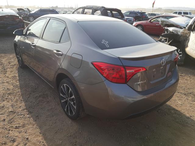 Photo 2 VIN: 5YFBURHE3KP865961 - TOYOTA COROLLA L 