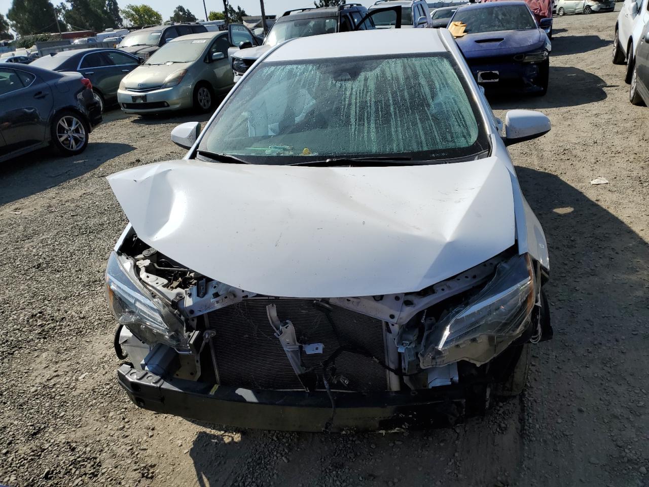 Photo 4 VIN: 5YFBURHE3KP866186 - TOYOTA COROLLA 