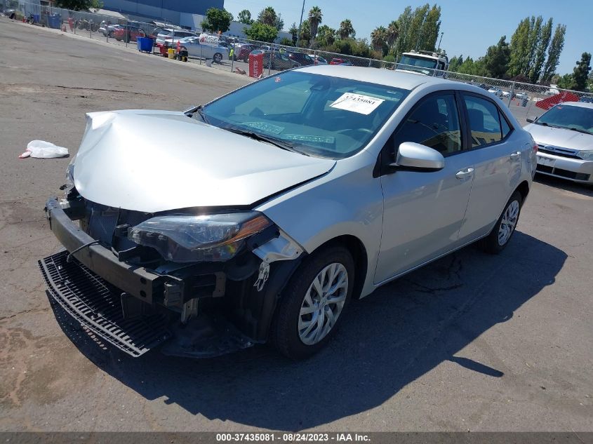 Photo 1 VIN: 5YFBURHE3KP867242 - TOYOTA COROLLA 