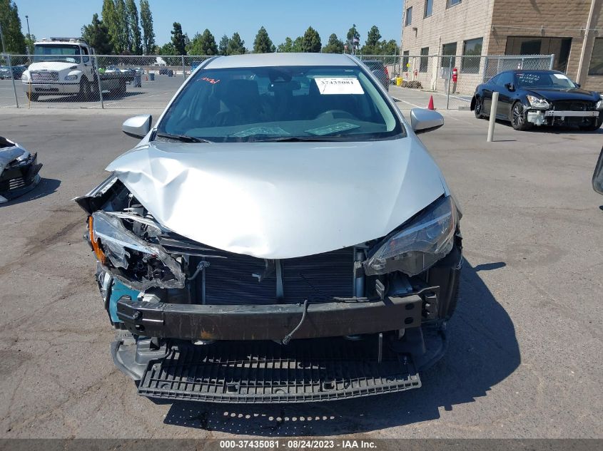 Photo 12 VIN: 5YFBURHE3KP867242 - TOYOTA COROLLA 