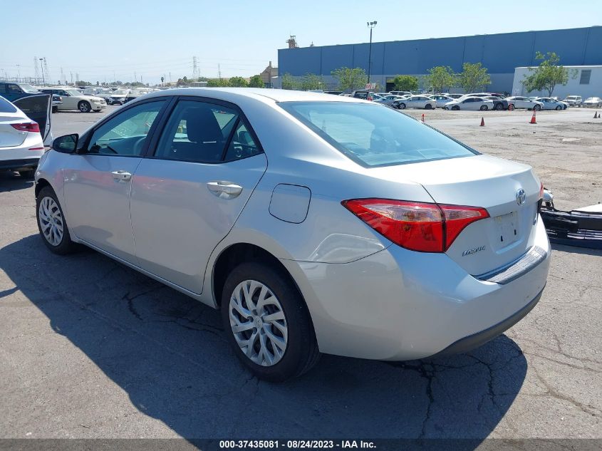 Photo 2 VIN: 5YFBURHE3KP867242 - TOYOTA COROLLA 