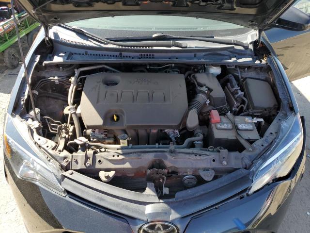 Photo 10 VIN: 5YFBURHE3KP871002 - TOYOTA COROLLA L 