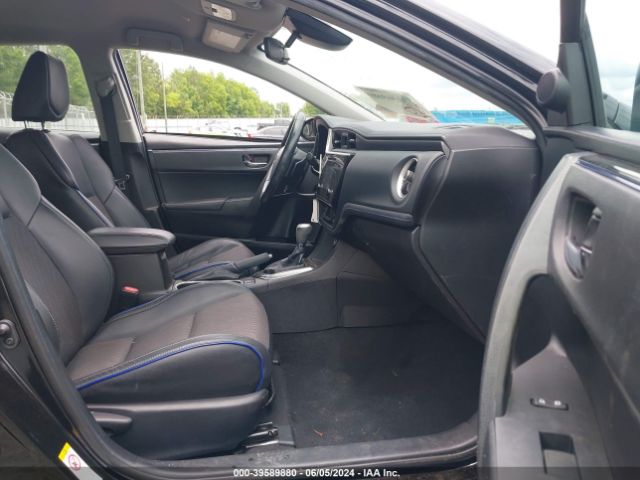 Photo 4 VIN: 5YFBURHE3KP872019 - TOYOTA COROLLA 