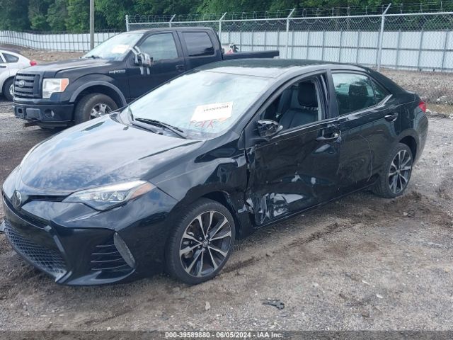 Photo 5 VIN: 5YFBURHE3KP872019 - TOYOTA COROLLA 