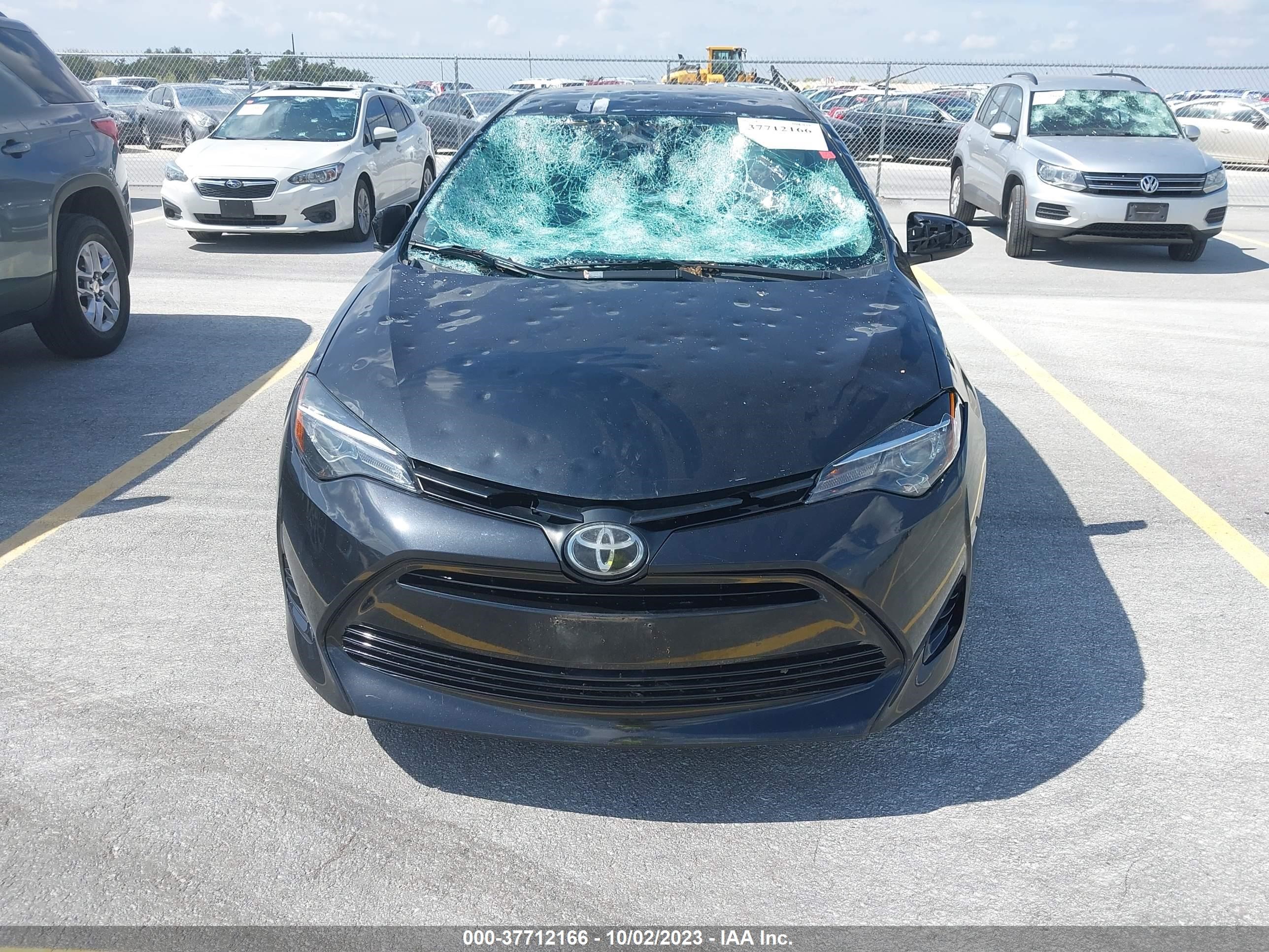 Photo 11 VIN: 5YFBURHE3KP874885 - TOYOTA COROLLA 