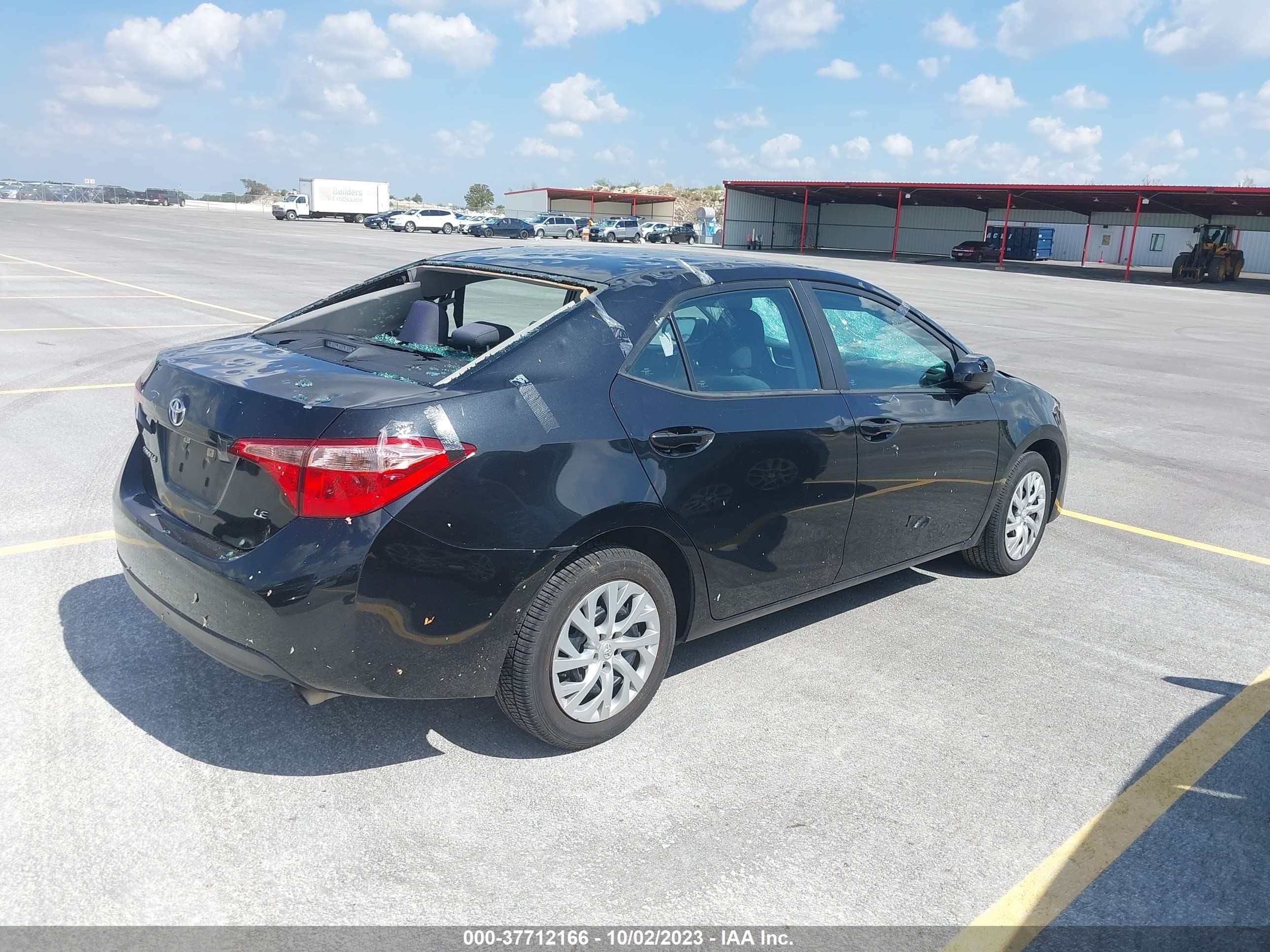 Photo 3 VIN: 5YFBURHE3KP874885 - TOYOTA COROLLA 