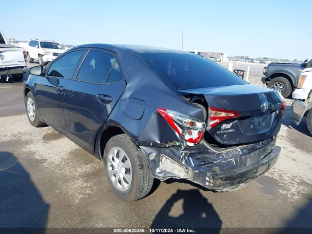 Photo 2 VIN: 5YFBURHE3KP875387 - TOYOTA COROLLA 