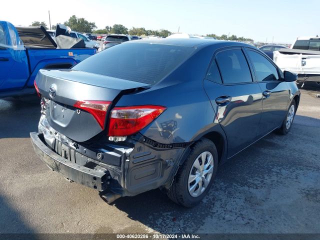 Photo 3 VIN: 5YFBURHE3KP875387 - TOYOTA COROLLA 