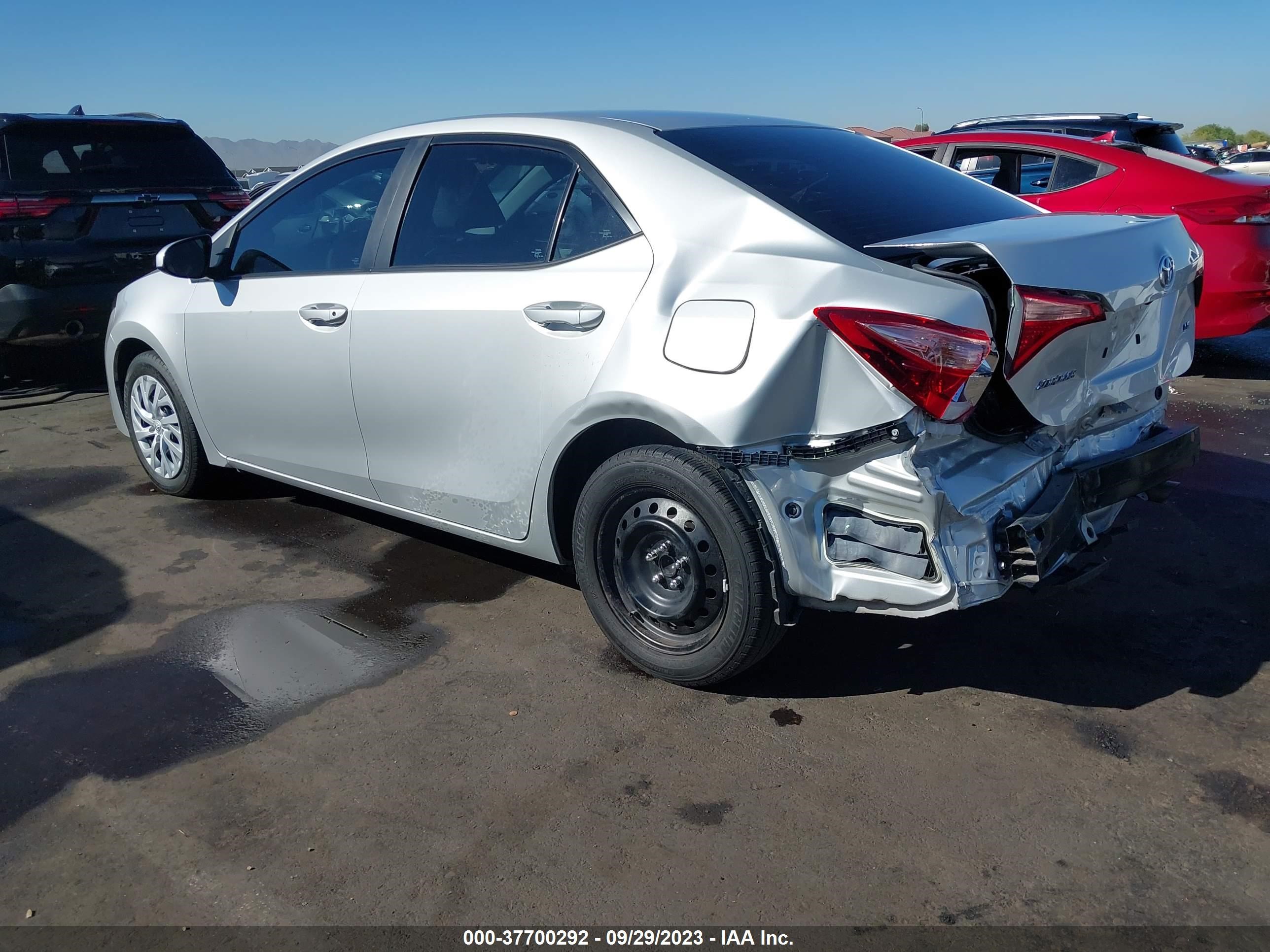 Photo 2 VIN: 5YFBURHE3KP877088 - TOYOTA COROLLA 