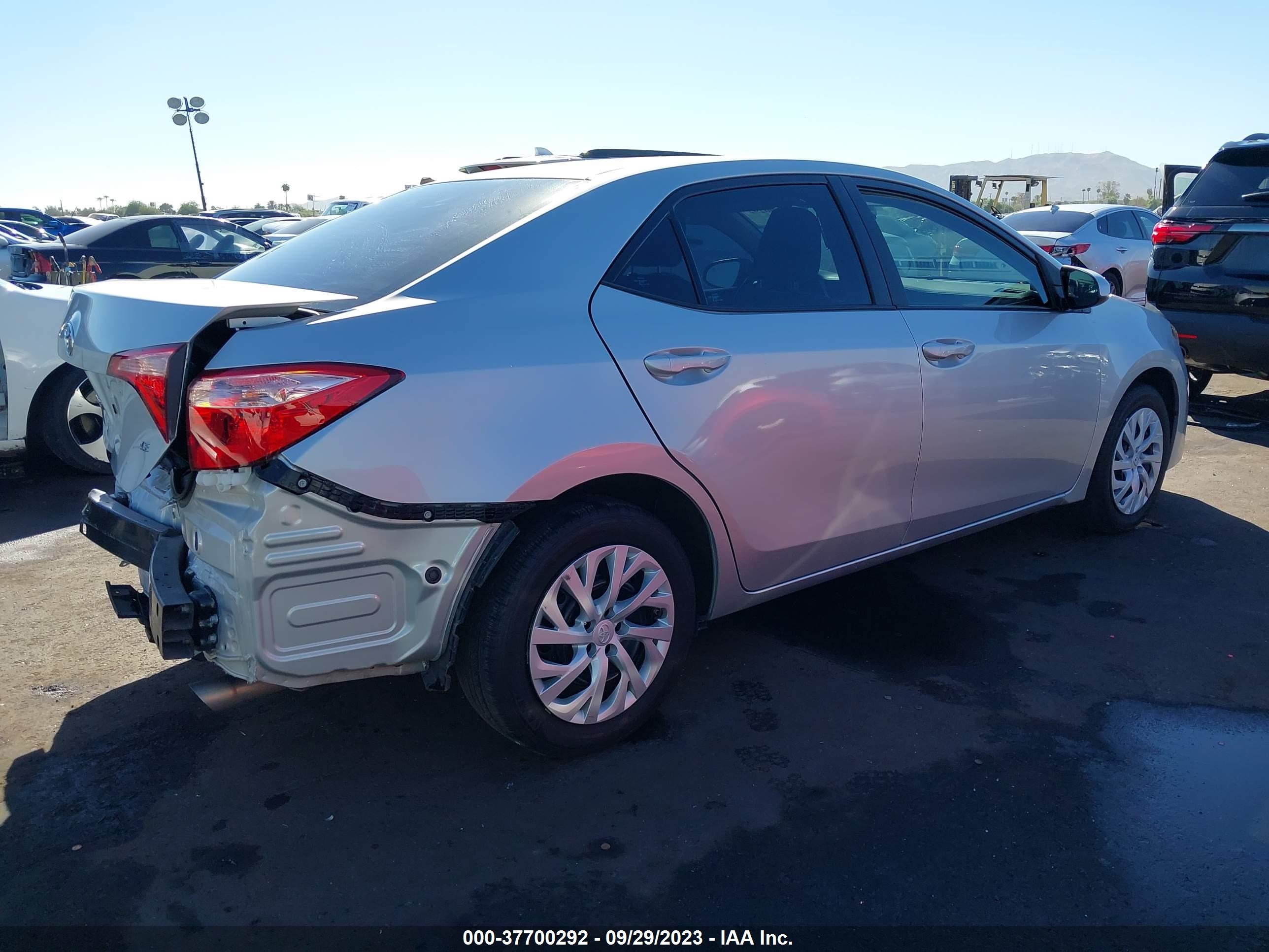 Photo 3 VIN: 5YFBURHE3KP877088 - TOYOTA COROLLA 