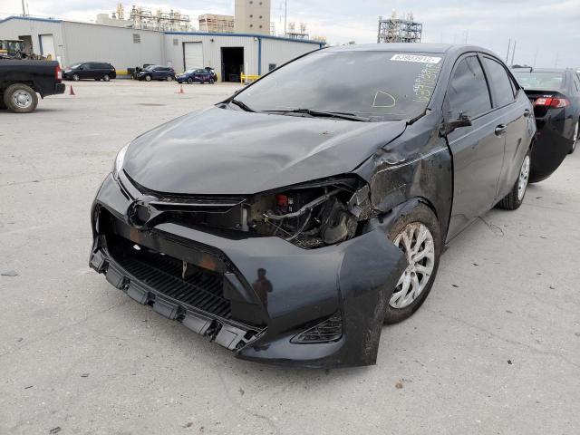 Photo 1 VIN: 5YFBURHE3KP878290 - TOYOTA COROLLA L 