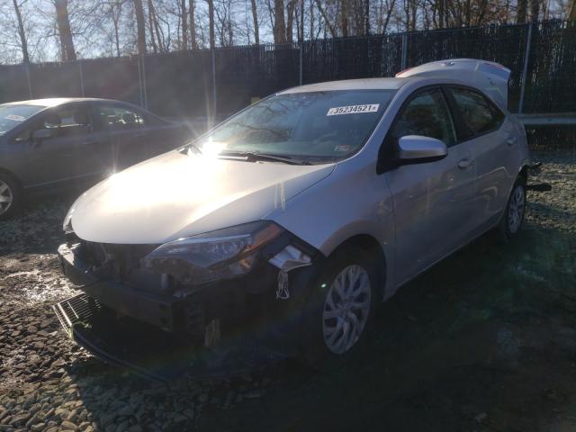 Photo 1 VIN: 5YFBURHE3KP878452 - TOYOTA COROLLA L 