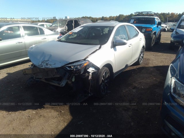 Photo 1 VIN: 5YFBURHE3KP879018 - TOYOTA COROLLA 