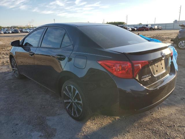 Photo 1 VIN: 5YFBURHE3KP880234 - TOYOTA COROLLA L 